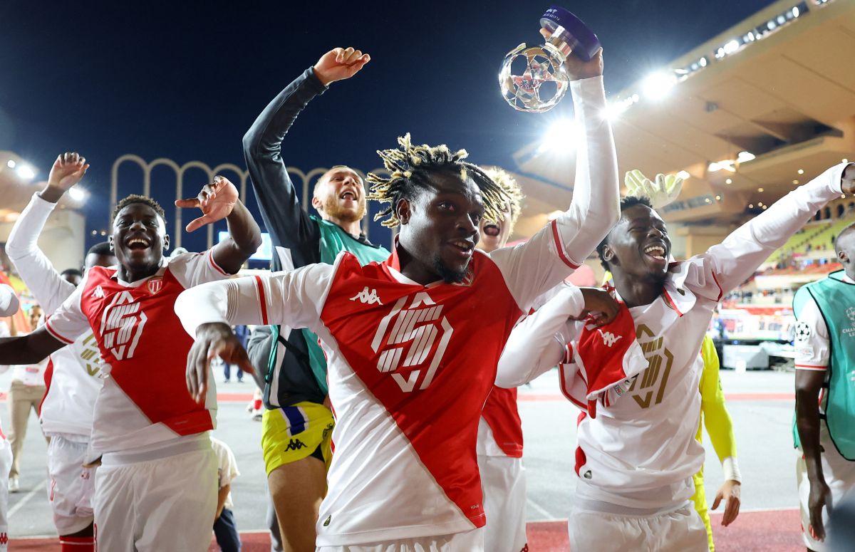 AS Monaco's players celebrate after winning their Champions League match against Barcelona