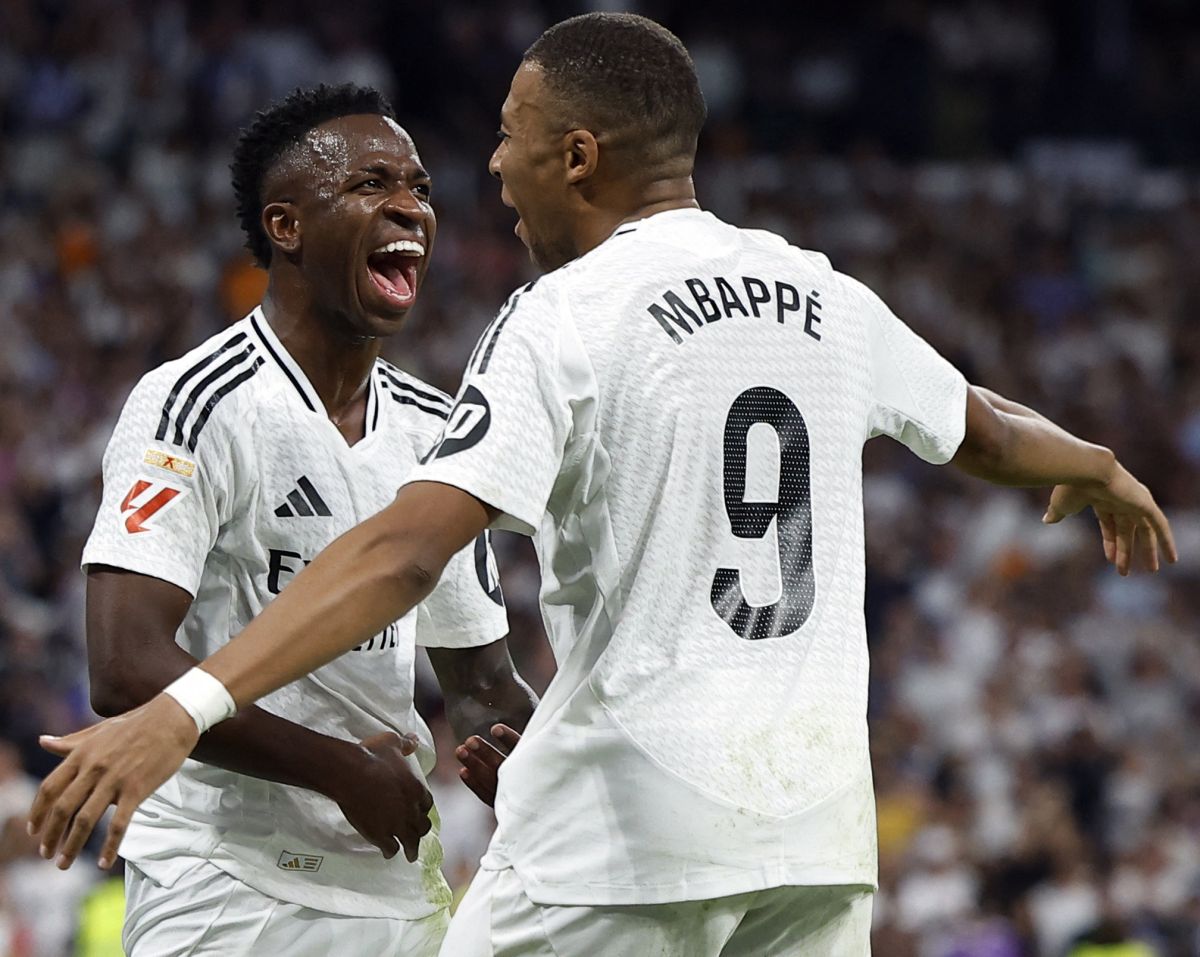 Real Madrid's Vinicius Junior celebrates scoring their third goal with Kylian Mbappe