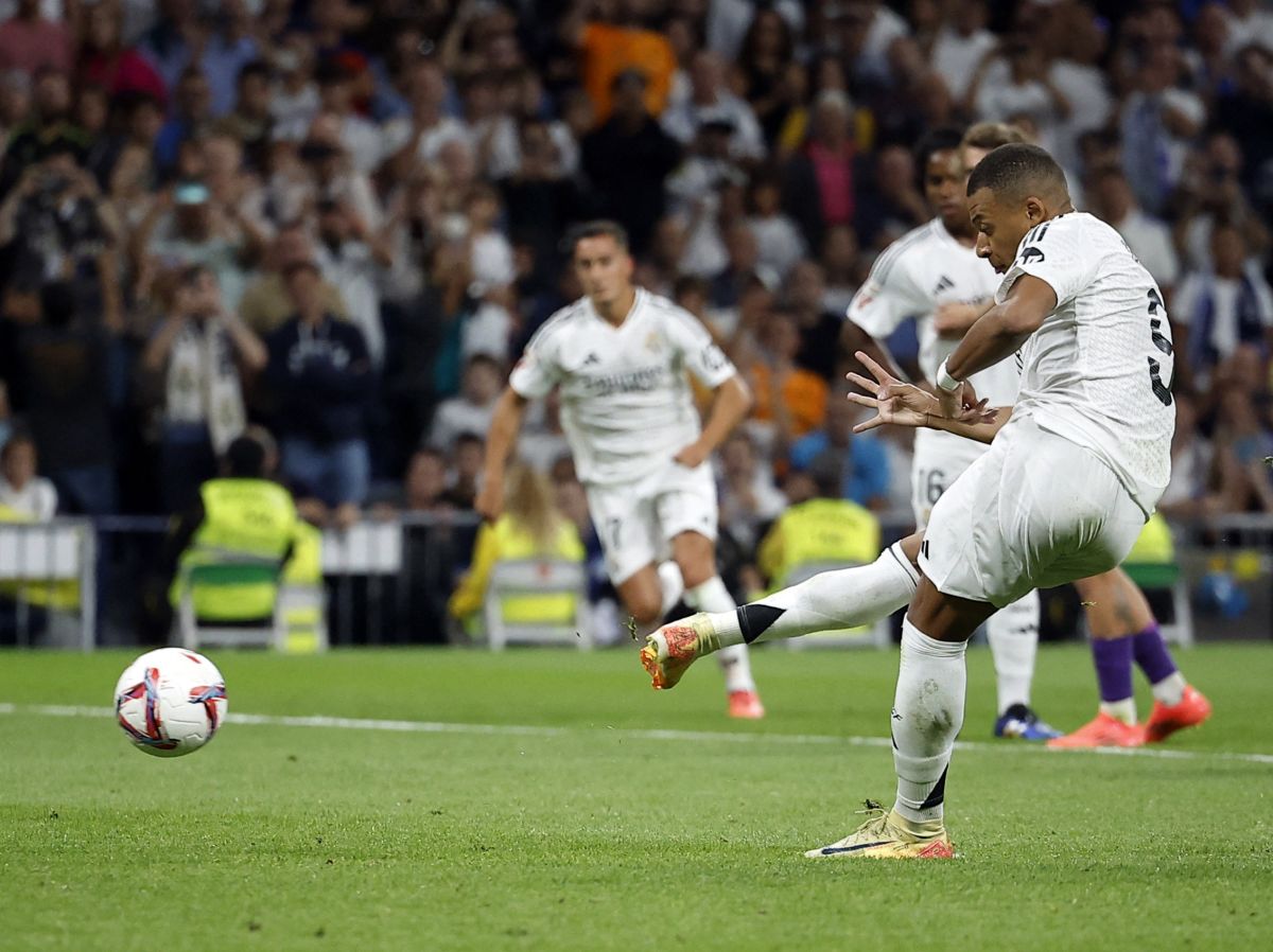 Real Madrid's Kylian Mbappe scores their fourth goal from the penalty spot