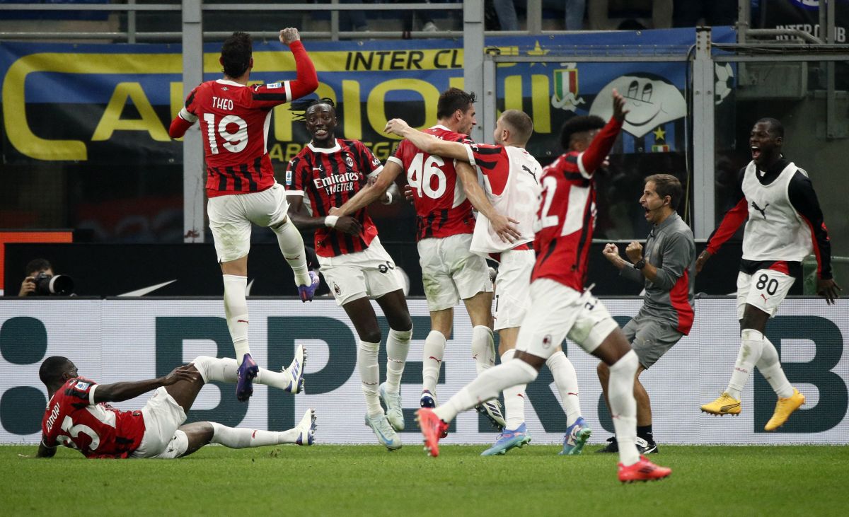 AC Milan's Matteo Gabbia celebrates scoring their second goal with teammates