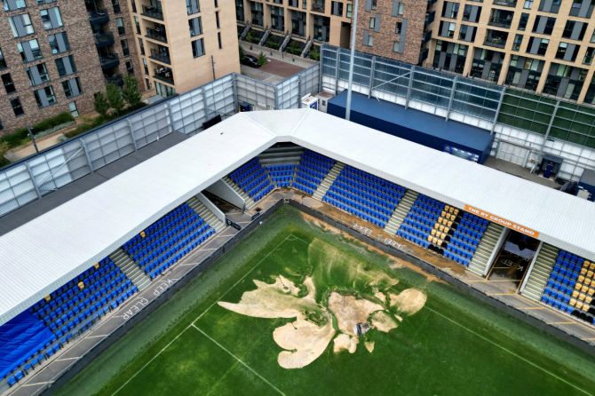 A drone view of a sink hole caused by heavy rainfall at the Cherry Red Records Stadium, home of AFC Wimbledon football club in London, Britain, on Monday, September 23, 2024.