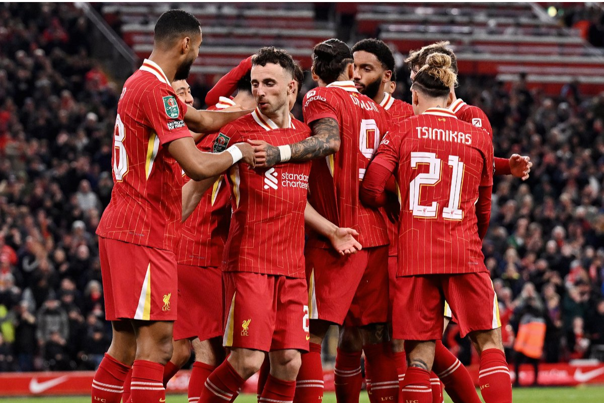 Liverpool players celebrate their League Cup win over West Ham at Anfield, on Wednesday