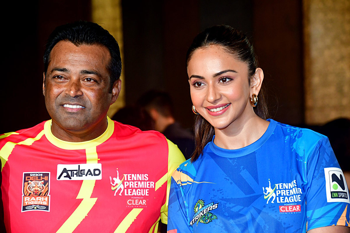 Brand ambassadors Leander Paes from Shrachi Delhi Rarh Tigers and Rakul Preet Singh from Hyderabad Strikers pose for a picture during the Tennis Premier League (TPL) Season 6 auctions, in Mumbai on Wednesday