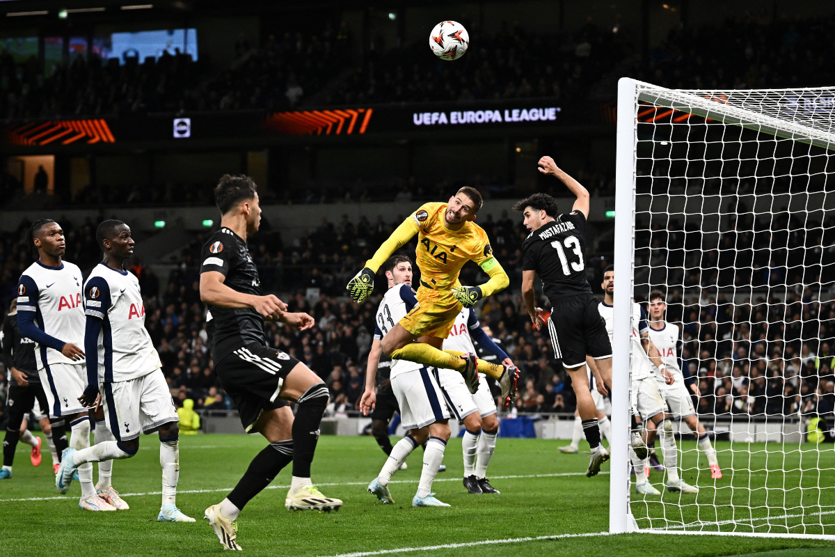 Tottenham Hotspur's Guglielmo Vicario in action with Qarabag's Bahlul Mustafazada 