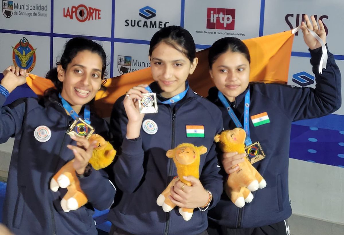 Kanishka Dagar, Lakshita and Anjali Chaudhary celebrate winning the gold medal in the women's 10m air pistol team event at the ISSF Junior World Championship in Lima, Peru.