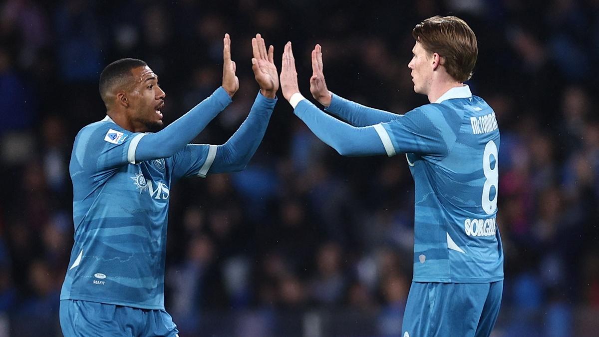 Scott McTominay celebrates scoring Napoli's first goal with Juan Jesus.