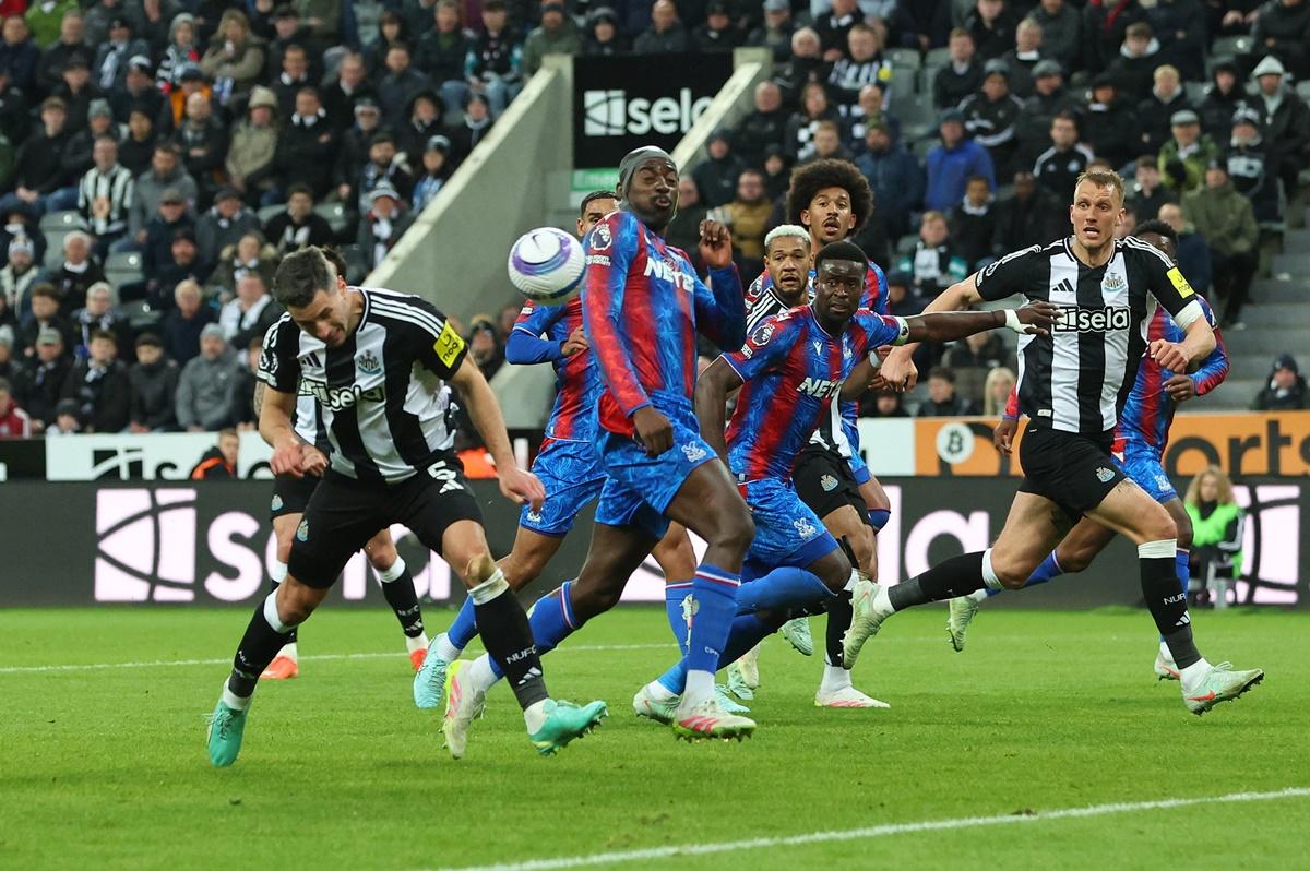 Fabian Schar glances a header to score Newcastle United's fourth goal.