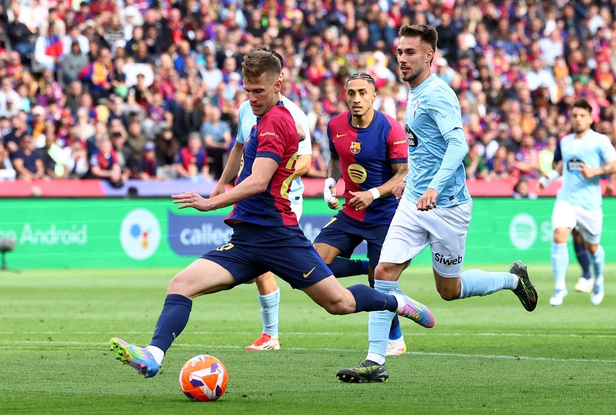 Dani Olmo scores Barcelona's second goal.