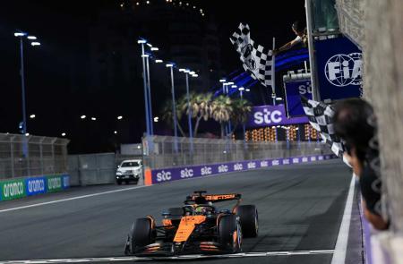 McLaren's Oscar Piastri crosses the finishing line to win the Saudi Arabian Grand Prix.
