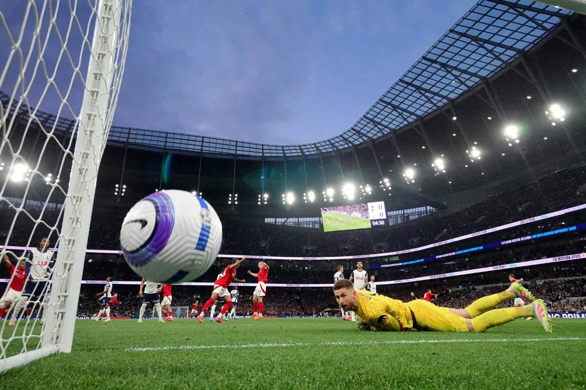 Nottingham Forest's Elliot Anderson scores their first goal past Tottenham Hotspur's Guglielmo Vicario during their IPL match at Tottenham Hotspur Stadium, London, on Monday