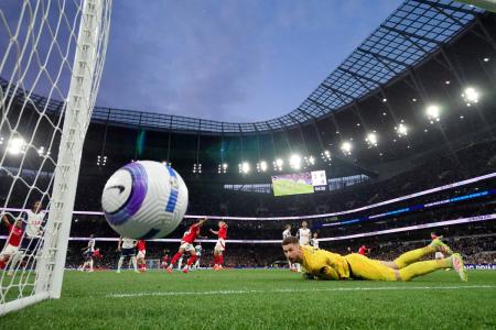 Nottingham Forest's Elliot Anderson scores their first goal past Tottenham Hotspur's Guglielmo Vicario during their IPL match at Tottenham Hotspur Stadium, London, on Monday