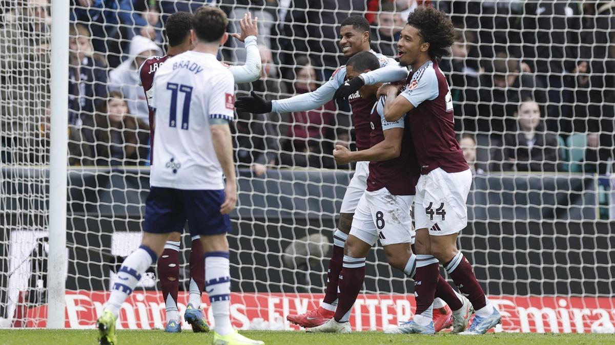 Marcus Rashford celebrates with Boubacar Kamara, Youri Tielemans and Jacob Ramsey after scoring Aston Villa's second goal during the FA Cup quarter-final against Preston North End at Deepdale, Preston, Britain, March 30, 2025.