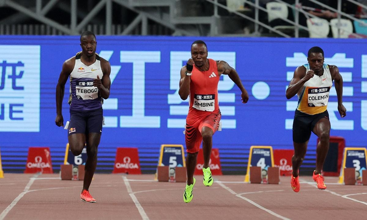 South Africa's Akani Simbine, centre, powered to victory in 9.99 seconds ahead of Kenyan Ferdinand Omanyala (10.13) and World indoor sprint champion Jeremiah Azu of Briton (10.17).