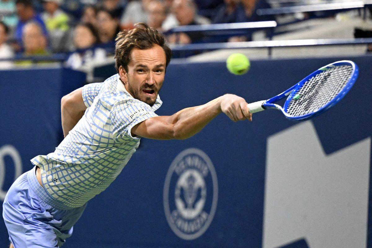 Daniil Medvedev plays a shot against Australia's Alexei Popyrin during third round play at Sobeys Stadium in Toronto, Ontario, Canada, on Thursday