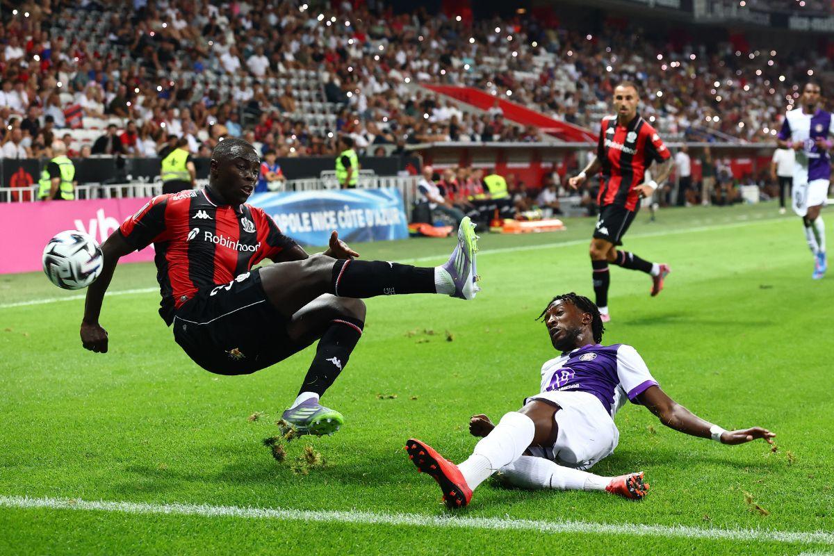 OGC Nice's Antoine Mendy (left) is challenged by Toulouse's Waren Kamanzi during their Ligue 1 match at Allianz Riviera, Nice, France, on Saturday