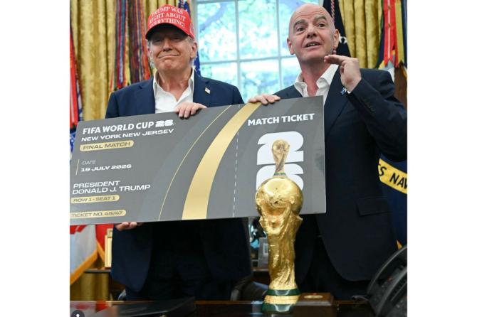 FIFA President Gianni Infantino presents the first ticket of the 2026 FIFA World Cup to US President Donald Trump on Friday