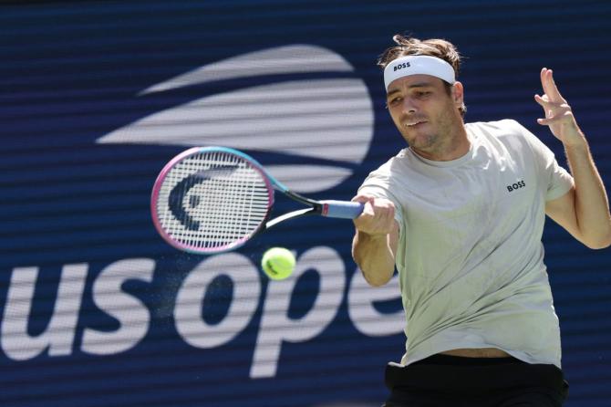American Taylor Fritz in action during his first round match against compatriot Emilio Nava