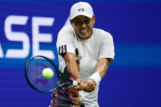 USA's Learner Tien was given a tennis lesson during his first round match against Serbia's Novak Djokovic