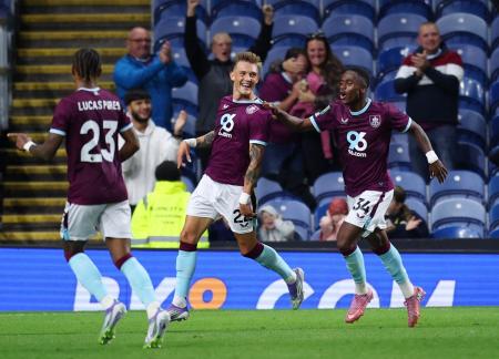 Oliver Sonne celebrates with Jaydon Banel after scoring Burnley's second goal against Derby County, at Turf Moor, Burnley.
