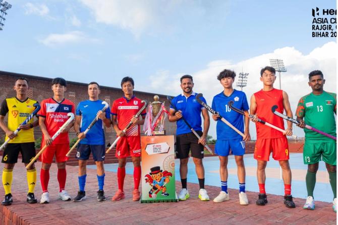 The participating teams with the Asia Cup trophy