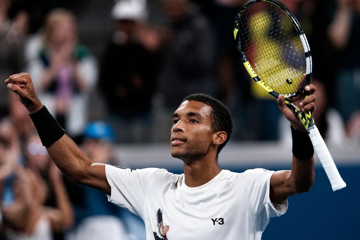 Canada's Felix Auger-Aliassime celebrates after winning his third round match against Germany's Alexander Zverev 