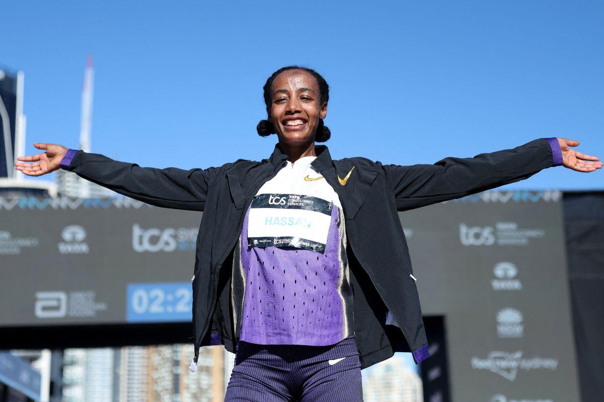 Netherlands' Sifan Hassan celebrates after winning the Sydney Marathon on Sunday