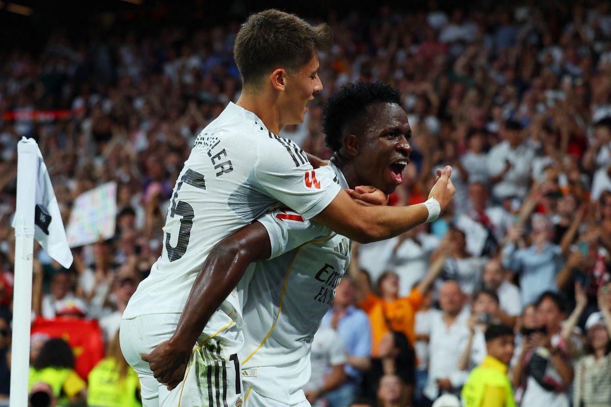 Real Madrid's Vinicius Junior celebrates with Arda Guler on scoring their second goal against Real Mallorca at Santiago Bernabeu, Madrid,