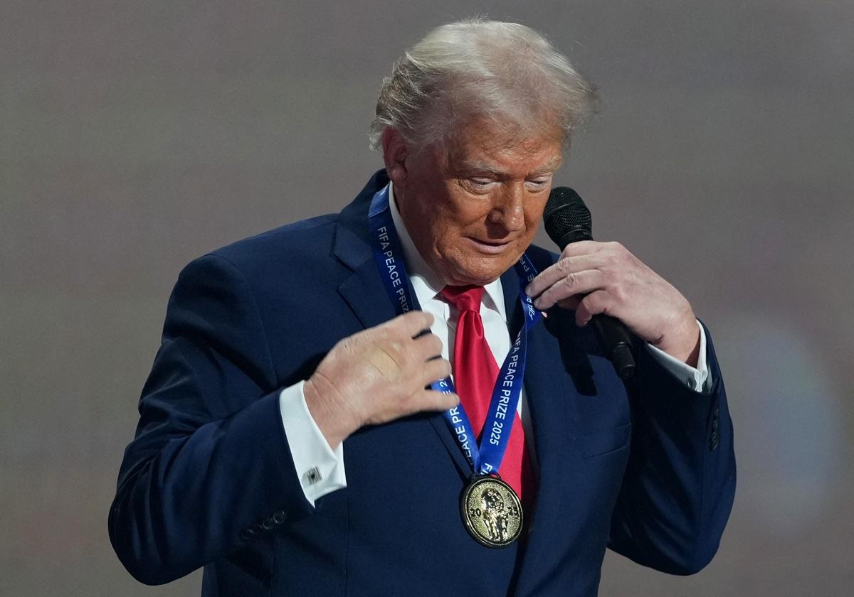 US President Donald Trump wears a medal as he is awarded the inaugural FIFA Peace Prize during the FIFA World Cup 2026 at John F. Kennedy Center for the Performing Arts, Washingtonon, on Friday.