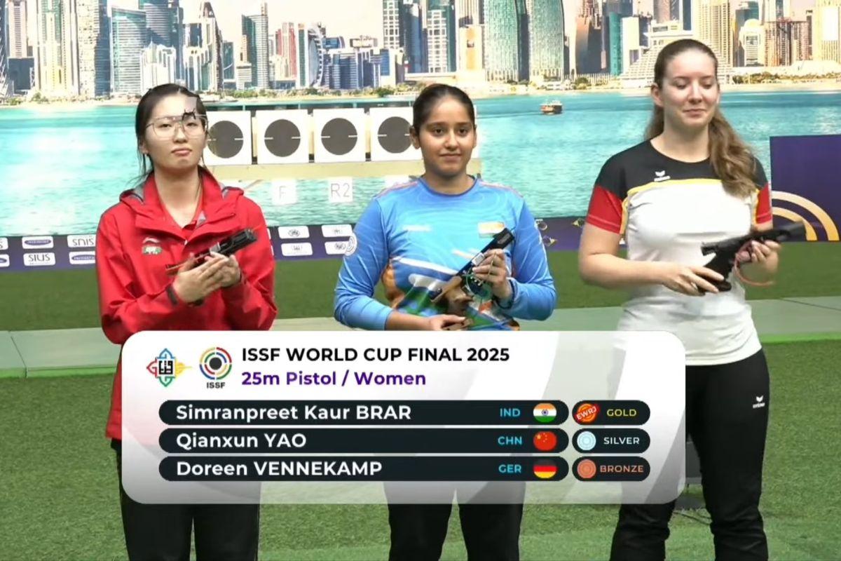India's Simranpreet Kaur Brar is flanked by Yao and Vinnekamp after winning gold in the women's 25m pistol event at the ISSF World Cup Final in Doha on Sunday