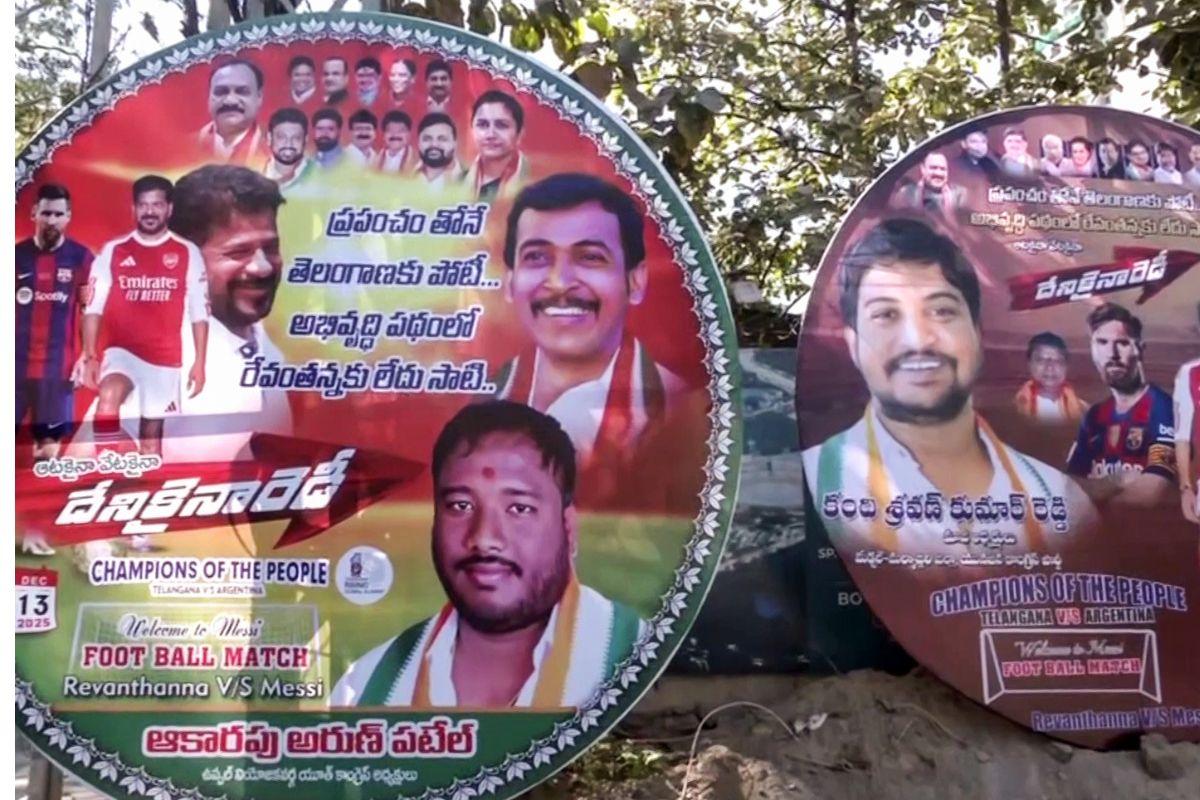 Posters of star footballer Lionel Messi and CM Revanth Reddy put up in the city ahead of Messi's G.O.A.T India Tour 2025, in Hyderabad on Friday
