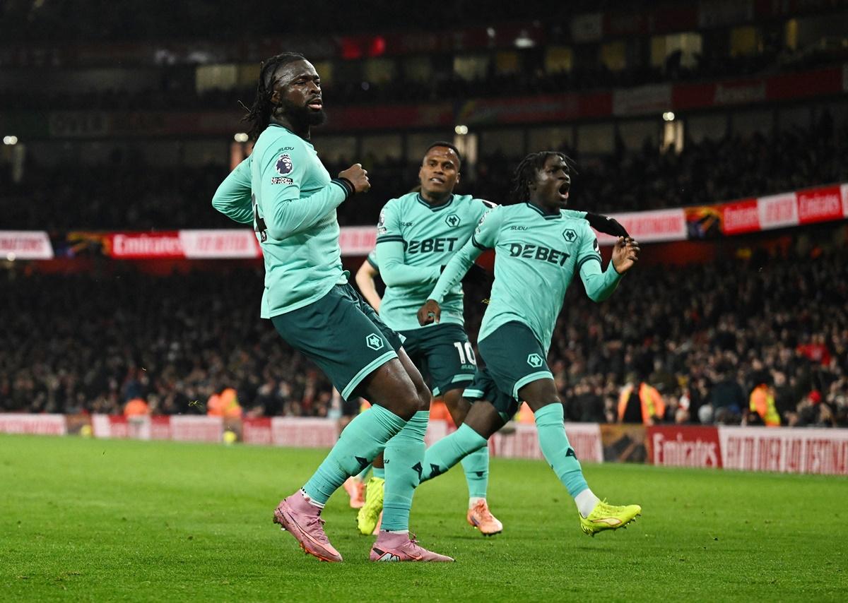 Tolu Arokodare celebrates with Jhon Arias and Mateus Mane after drawing Wolverhampton Wanderers level in the 90th minute of the match.
