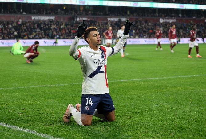 Desire Doue celebrates scoring Paris St Germain's third goal during the Ligue 1 match against FC Metz at Stade Saint-Symphorien, Metz, France.