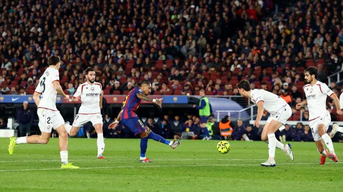 Raphinha scores Barcelona's first goal during LaLiga match against Osasuna at Spotify Camp Nou, Barcelona, on Saturday.