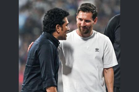 Lionel Messi with Sachin Tendulkar at the Wankhede Stadium during the Mumbai leg of his GOAT tour, on Sunday