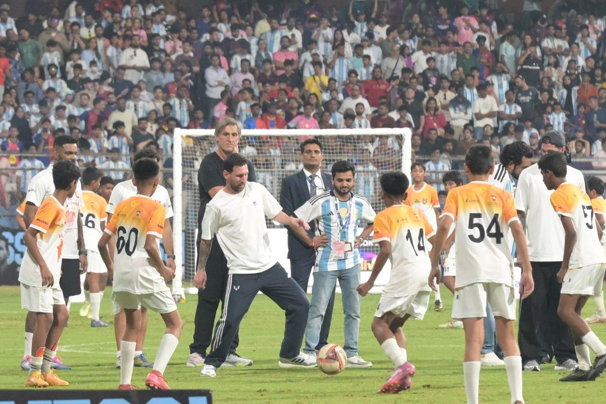 Lionel Messi plays football