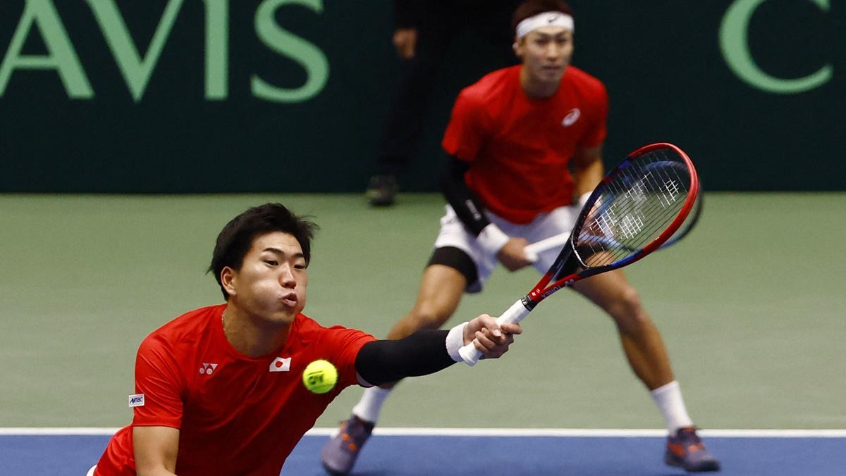 Japan's Yosuke Watanuki and Takeru Yuzuki in action during their Davis Cup doubles match against Britain's Neal Skupski and Joe Salisbury at Bourbon Beans Dome, Miki, Japan, on Saturday.