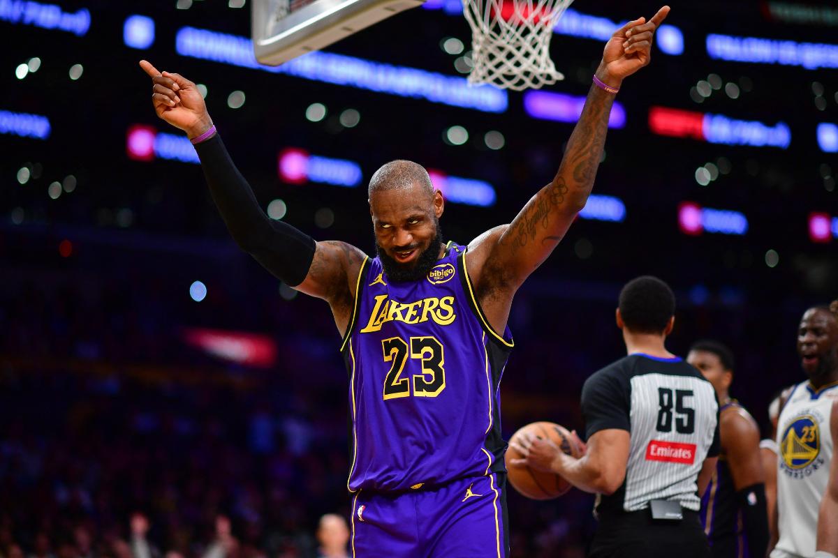 Los Angeles Lakers forward LeBron James (23) reacts after scoring against Golden State Warriors during the second half of their NBA match at Crypto.com Arena on Thursday