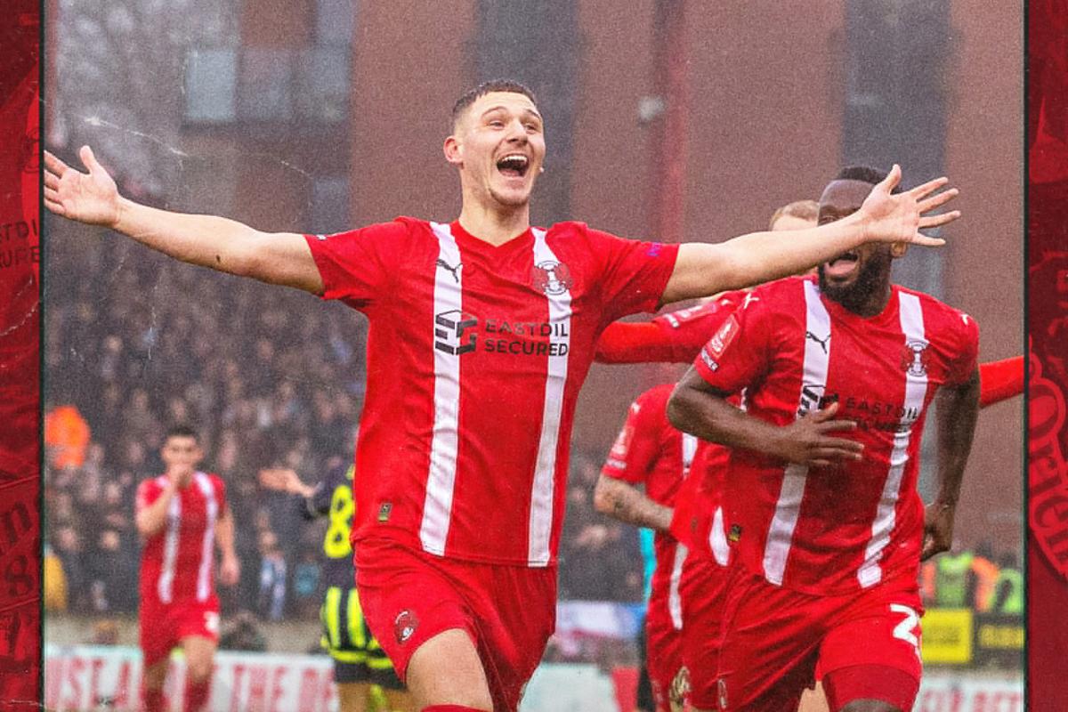 Leyton Orient's Donley celebrates scoring their opening via a stunning long ranger