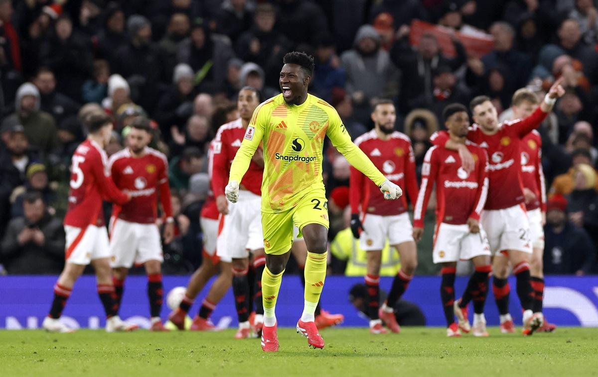 Manchester United goalkeeper Andre Onana celebrates after Harry Maguire scores their second goal in extra-time.