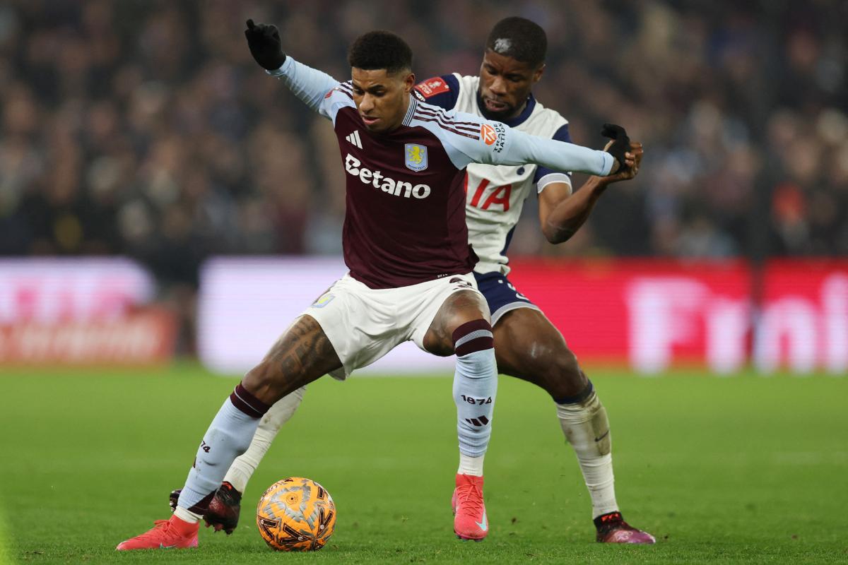 Aston Villa's Marcus Rashford in action with Tottenham Hotspur's Kevin Danso 