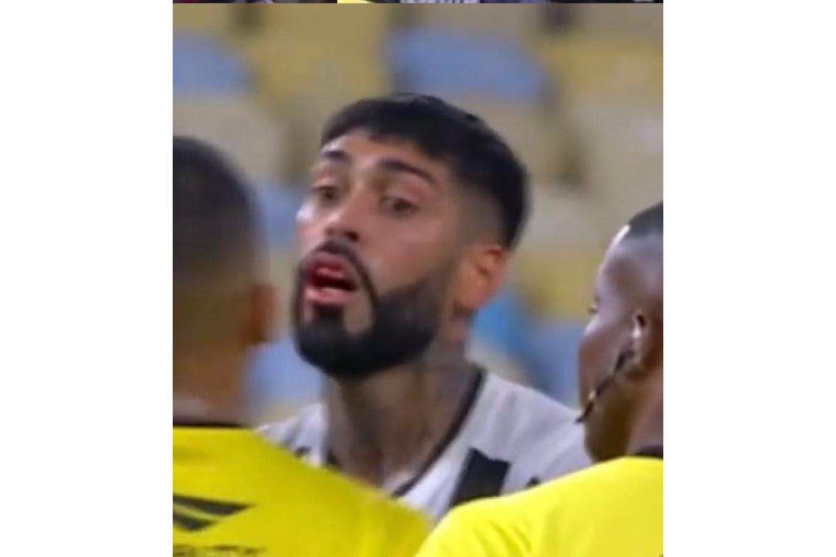 Botafogo's Alexander Barboza is knocked in the teeth during an altercation after the derby at the Carloca Championships in Maracana