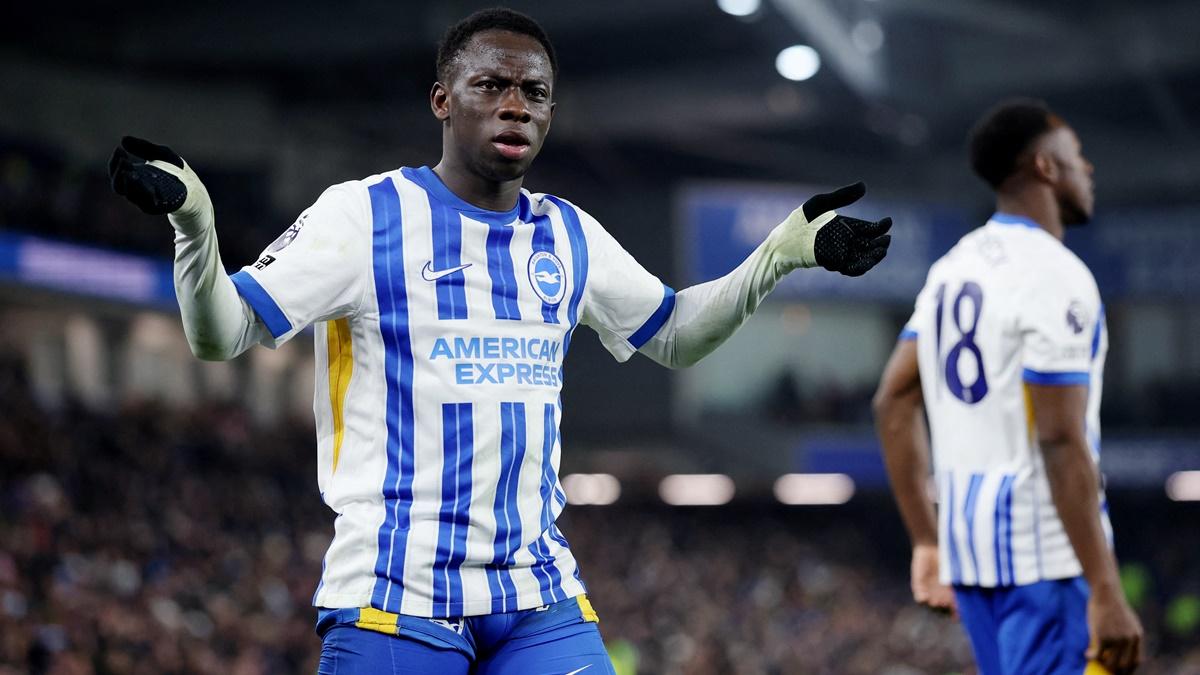 Yankuba Minteh celebrates scoring Brighton & Hove Albion's third goal.