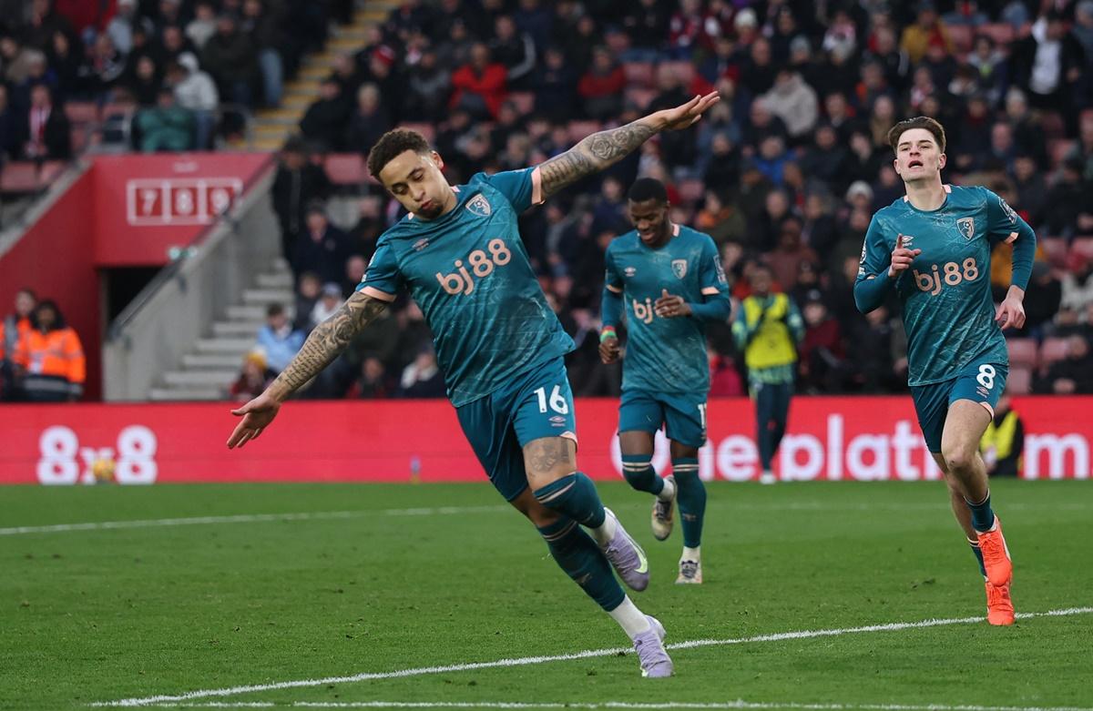 Marcus Tavernier celebrates scoring Bournemouth's third goal.