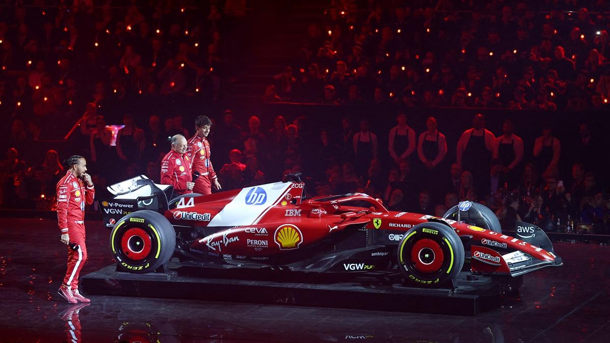 Ferrari team principal Frederic Vasseur with drivers Lewis Hamilton and Charles Leclerc during their car reveal at the launch.