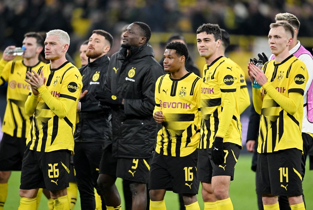 Borussia Dortmund's Julian Ryerson, Serhou Guirassy, Julien Duranville, Giovanni Reyna and Maximilian Beier celebrate after the match.