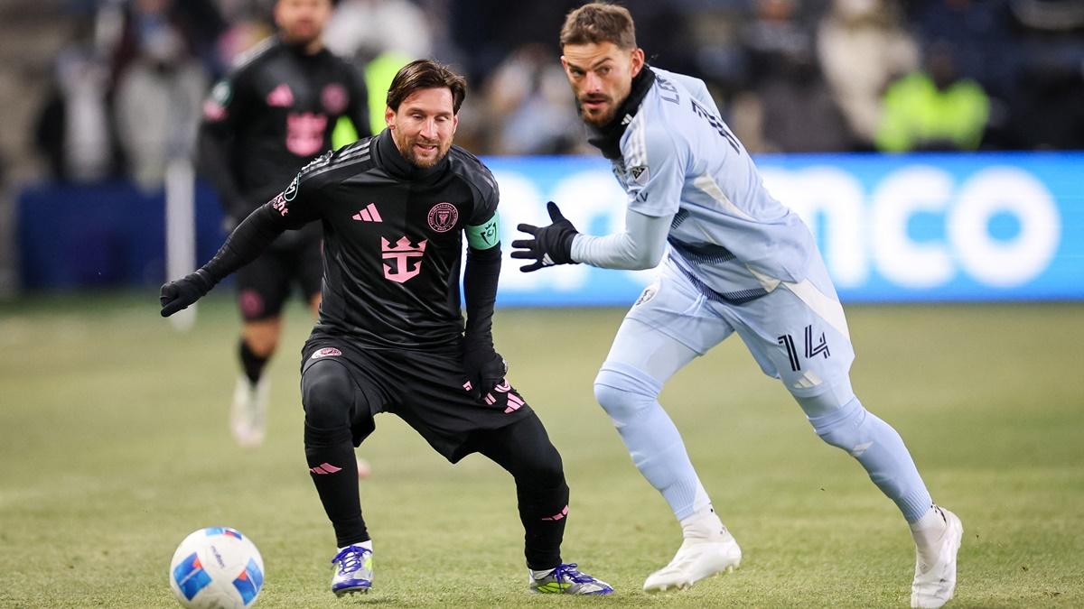 Inter Miami forward Lionel Messi works his way past Sporting Kansas City defender Tim Leibold during the first leg of the CONCACAF Champions Cup's first round match at  Children's Mercy Park, Kansas City, on Wednesday.