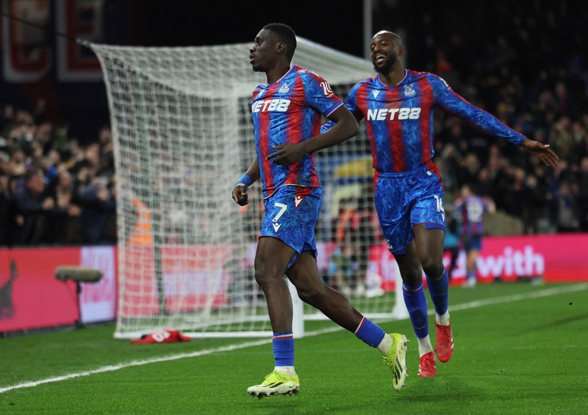 Ismaila Sarr celebrates scoring Crystal Palace's third goal with Jean-Philippe Mateta.