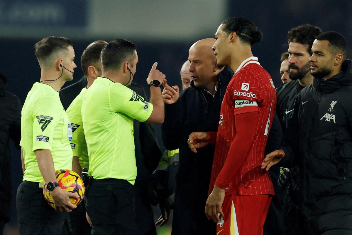 Liverpool manager Arne Slot remonstrates with referee Michael Oliver after the match before being sent off during the Premier League match against Everton at Goodison Park in Liverpool on February 12