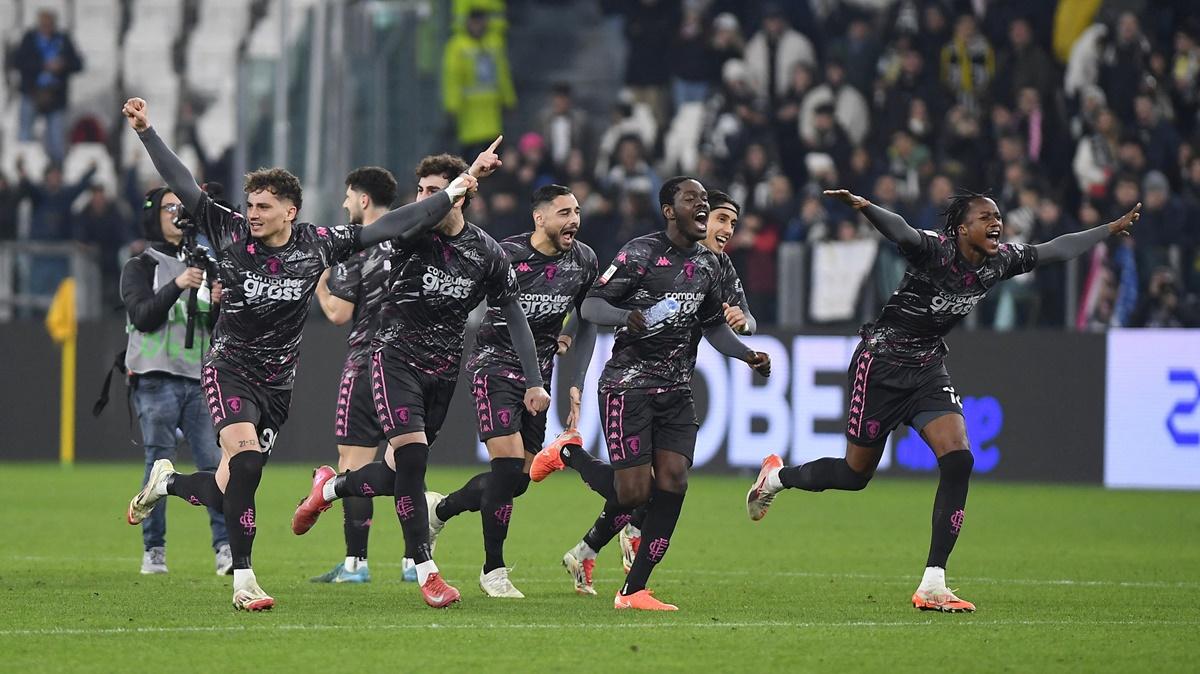 Empoli players celebrate after winning the penalty shoot-out.