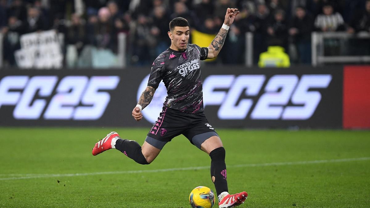 Empoli's Luca Marianucci scores the winning goal in the penalty shoot-out during the Coppa Italia quarter-final against Juventus at Allianz Stadium, Turin, on Wednesday.